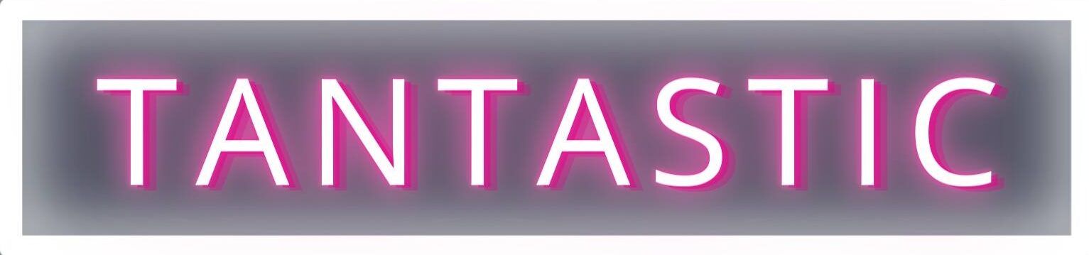 The Tantastic neon sign glowing pink